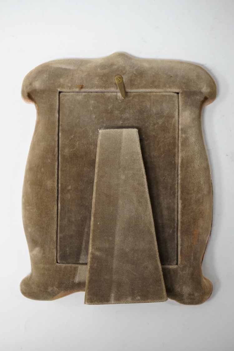 A George V Art Nouveau silver mounted photograph frame, with stylised decoration, William Neale & Son Ltd, Birmingham, 1912, 21.2cm. Condition - poor to fair